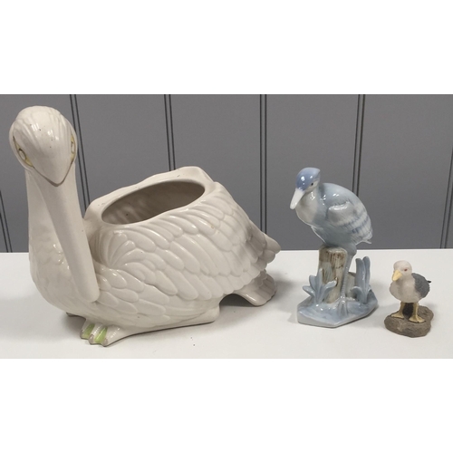 601 - A ceramic stork plant holder, together with two other bird figures.