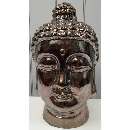 639 - A bronze-coloured, contemporary sleeping Buddha's head. Dimensions(cm) H38, W23, D13.