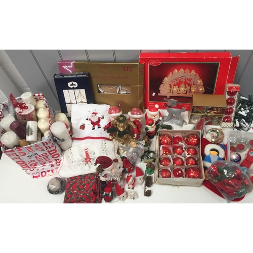 640 - A large selection of Christmas decorations. To include lights, tree decorations etc.