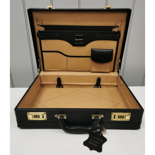 696 - A good quality leather briefcase, by 'Carlton'. Dimensions(cm) H32, W45, D10.