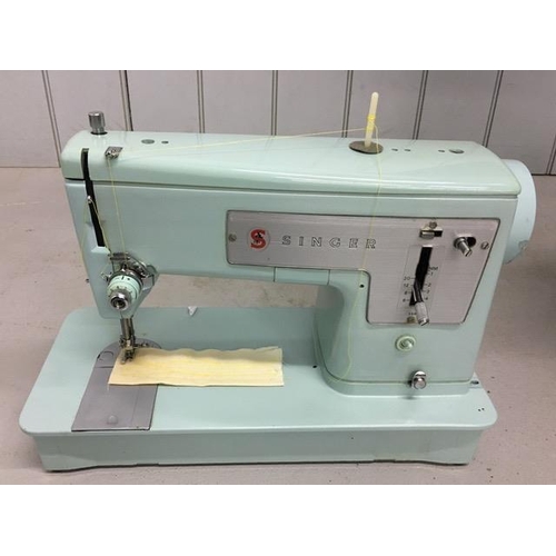 818 - A vintage 1966 Singer sewing machine, with case. Model 339. Complete with original power cord, pedal... 