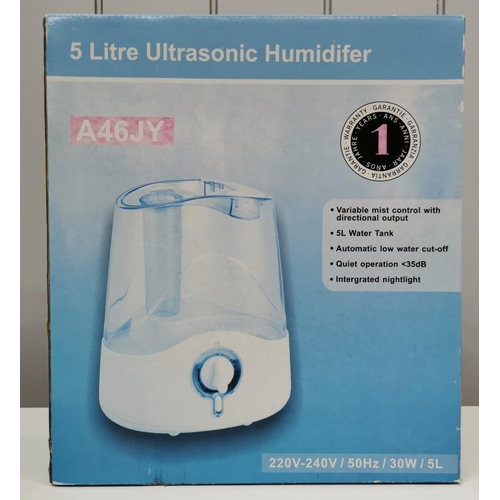 830 - A boxed 5 litre ultrasonic humidifier with integrated nightlight. Model number A46JY. Appears new & ... 