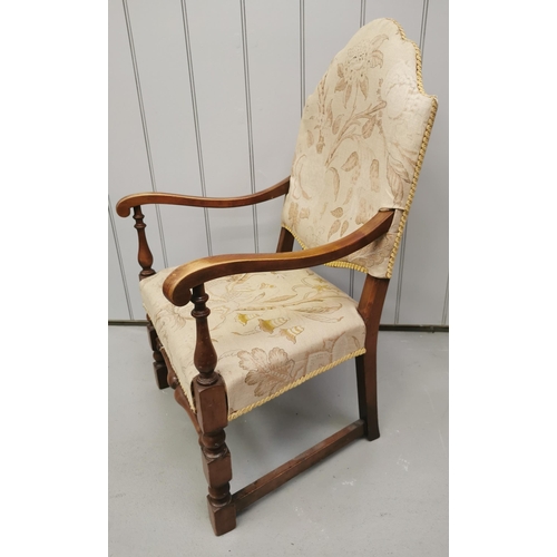 1013 - A vintage high-backed armchair, upholstered in beige fabric, with leaf print design. Dimensions(cm) ... 