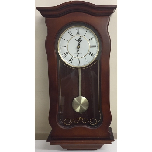 1187 - A battery operated 'Westminster Chime' wall clock, by 'Acctim'. Tested & appears in working order. D... 