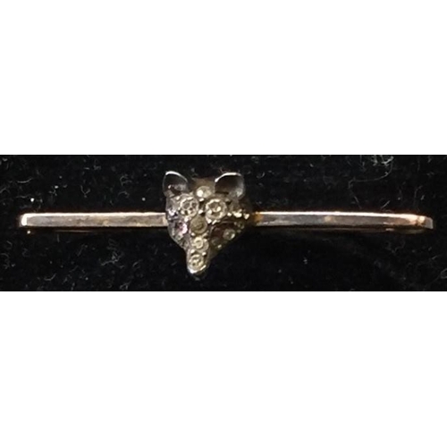 1204 - A vintage, boxed, 9ct Gold pin brooch, with silver fox head & garnet eyes. Weight approx. 2.4g