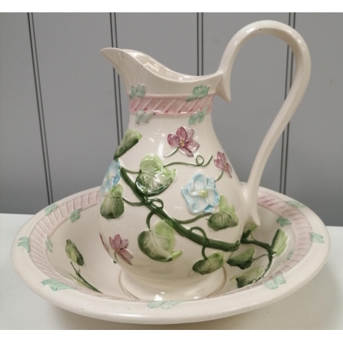 A vintage wash set, with a pretty floral pattern. No maker's mark.