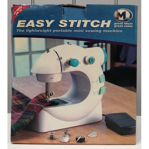 1566 - Easy Stitch portable mini sewing machine in original box, by 'JML'. Foot pedal & AC/DC adaptor not p... 