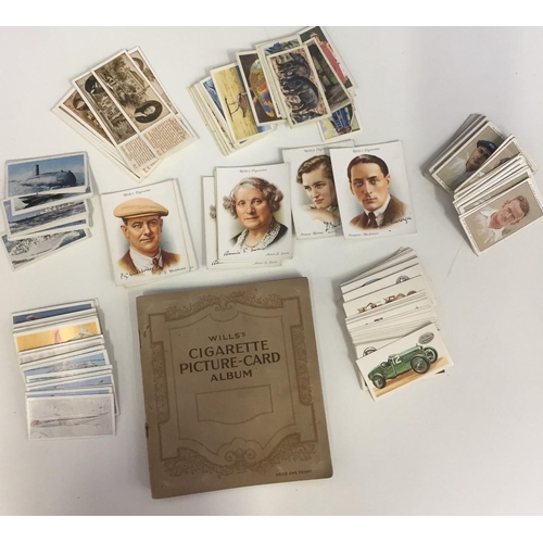 1600 - A collection of loose tea & cigarette cards, together with a Wills's cigarette card album.