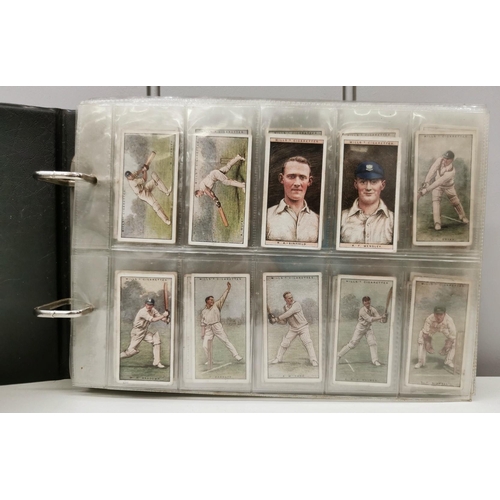 1613 - A collector's album of cigarette cards. To include WD & HO Wills - 'Cricketers'; John Player & Sons ... 