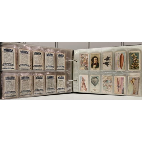 1613 - A collector's album of cigarette cards. To include WD & HO Wills - 'Cricketers'; John Player & Sons ... 