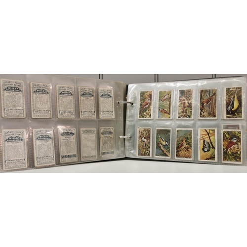 1613 - A collector's album of cigarette cards. To include WD & HO Wills - 'Cricketers'; John Player & Sons ... 