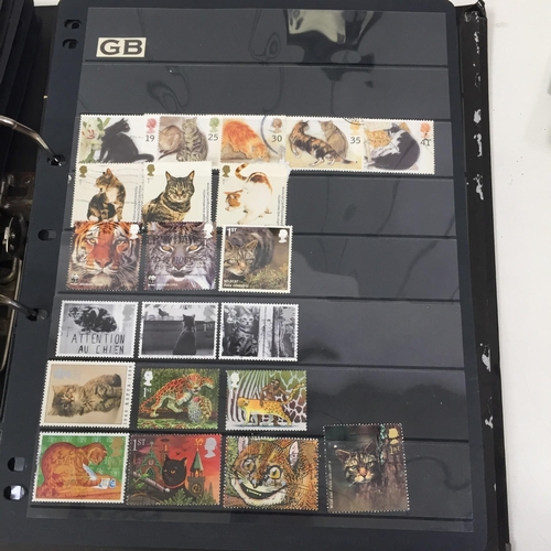 1626 - Two partially-completed stamp albums , with a 'Cats of the World' theme.