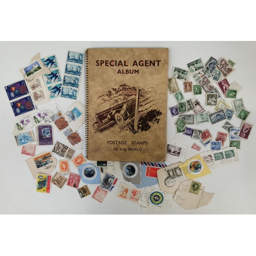 1630 - A partially-filled, vintage 'Special Agent' stamp album containing various stamps of the World, toge... 