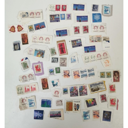 1631 - A very large collection of loose, worldwide stamps. Mostly mid-late 20th century.