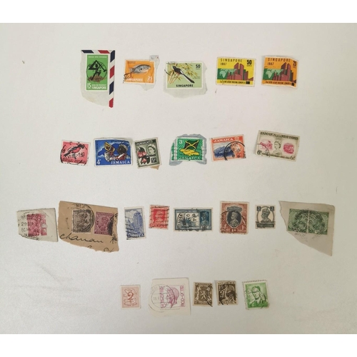 1631 - A very large collection of loose, worldwide stamps. Mostly mid-late 20th century.