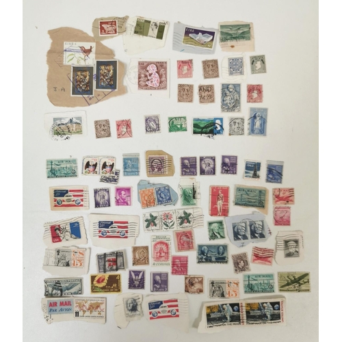 1631 - A very large collection of loose, worldwide stamps. Mostly mid-late 20th century.