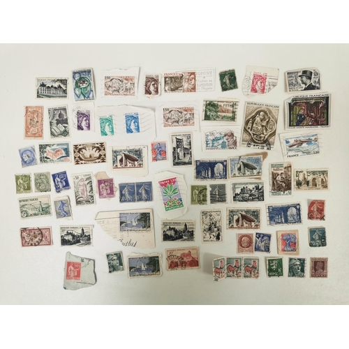 1631 - A very large collection of loose, worldwide stamps. Mostly mid-late 20th century.