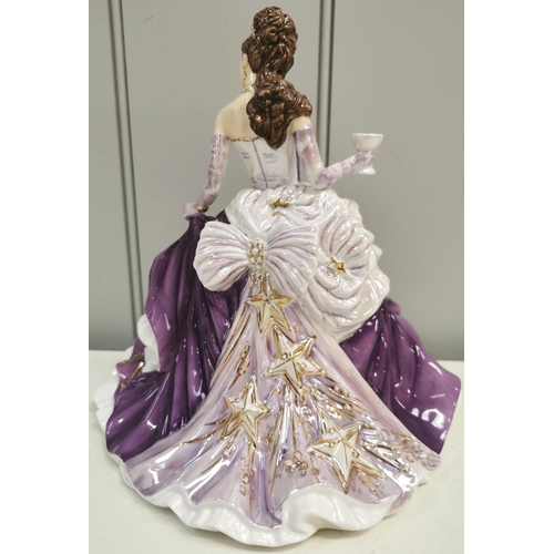 1388 - A boxed 'The English Ladies Co.' - 'Amethyst' figurine. Height 22cm.