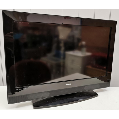 1565 - A flat-screen Beko 32inch HD digital TV, model no. 32WLU530HID. No remote control present. PAT Test ... 