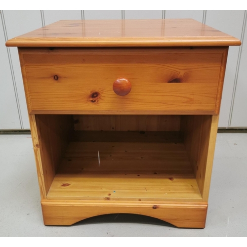 1004 - A pine-coloured bedside table with single drawer. Dimensions(cm) H50, W48, D45.