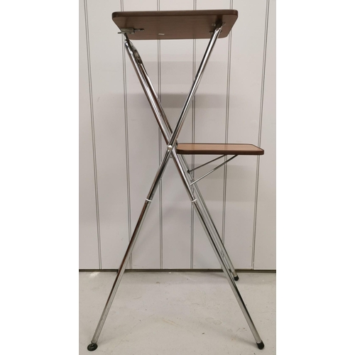 970 - A mid-century, formica folding projector stand. Dimensions(cm) H108, W39, D52.