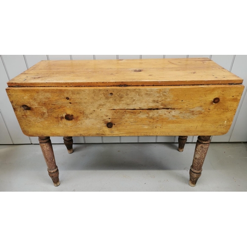 978 - A farmhouse-style, pine drop leaf kitchen table, with single cutlery draw. Dimensions(cm) H74, W50/1... 