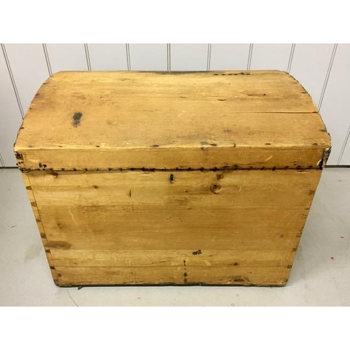 1006 - A vintage, dome-topped traveller's trunk. Dimensions(cm) H58, W74, D51.