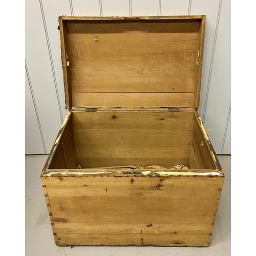 1006 - A vintage, dome-topped traveller's trunk. Dimensions(cm) H58, W74, D51.