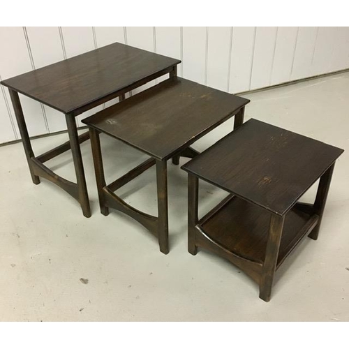 14 - A vintage nest of three tables. Largest dimensions(cm) H49, W60, D40.