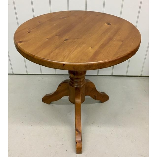 66 - A solid pine circular, pedestal breakfast table & three wheelback chairs.
Dimensions(cm) Table H78, ... 