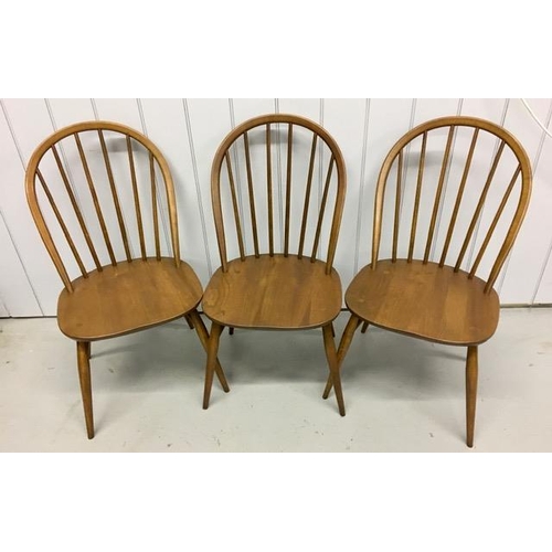 97 - A set of six, dark elm Ercol Windsor chairs. Dimensions(cm) H90(42 to seat), W45, D55.