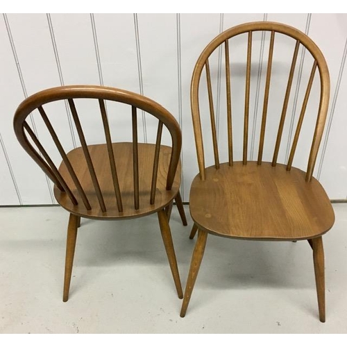 97 - A set of six, dark elm Ercol Windsor chairs. Dimensions(cm) H90(42 to seat), W45, D55.