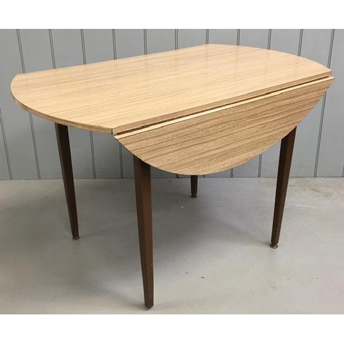 102 - A vintage, drop-leaf, Formica dining table. Dimensions(cm) H74, W112, D70/112.