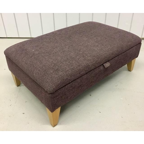 123 - An aubergine fabric lounge ottoman footstall, with a hinged top & beech-coloured feet. Dimensions(cm... 