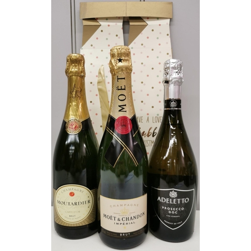 254 - A selection of three bottles of celebration alcohol. To include Moutadier Champagne, Moet & Chandon ... 