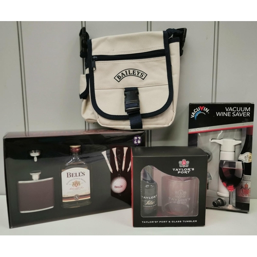 265 - A selection of two alcohol-related gift sets (Taylor's Port & Bell's Whiskey), a boxed vacuum wine s... 