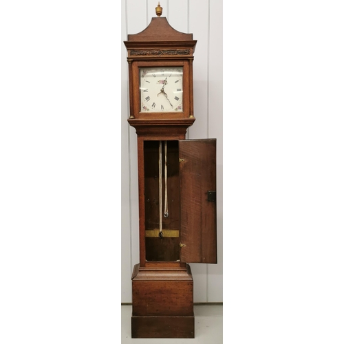 388 - An oak cased grandfather clock, with key present. Vendor advises clock is in in good working order &... 