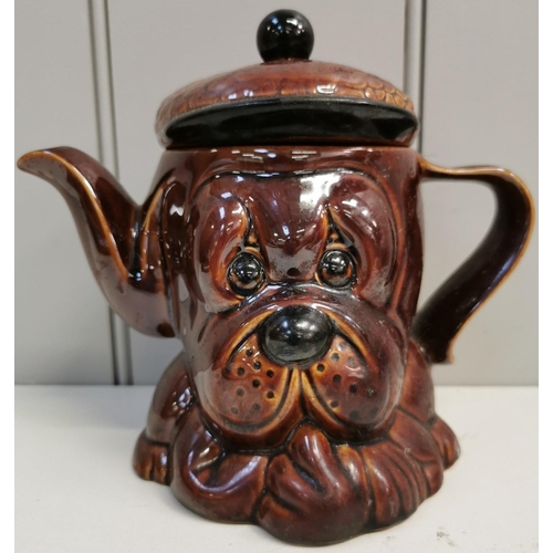 497 - A vintage, glazed, Price & Kensington Bloodhound teapot. Height 18cm.