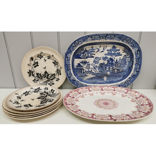 504 - A selection of antique dinnerware. To include a blue & white platter, a red & white platter (signifi... 