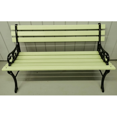 An iron-framed garden bench, with a painted sage green seat & backrest. Dimensions(cm) H70(36 to seat), W117, D54.