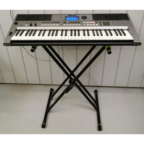 1540 - A 61 key Yamaha electronic keyboard, with folding black stand. Model no PSRE443. PAT Test pass & fun... 