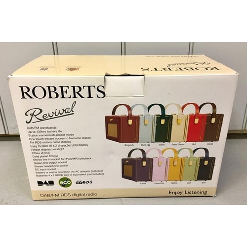 771 - A boxed/used 'Roberts - Revival' radio, in cream. No mains adaptor present. Untested.