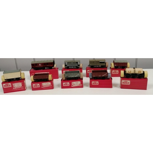 A collection of nine, boxed Hornby-Dublo wagons. To include 6-wheeled Passenger Brake Van; Goods Brake Van M.R.; Goods Brake Van W.R.; Gunpowder Van; 6-ton Refrigerator Van W.R.; Goods Wagon Steel Type; 16-ton Mineral Wagon; 16-ton Mineral Wagon (brown); Milk Tank Wagon 'United Dairies'. Model no's: 4076; 4310; 4312; 4313; 4320; 4640; 4655; 4656 & 4657.