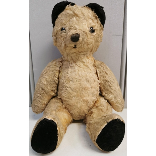 4085 - An early-mid 1900's, straw-filled 'Sooty' teddy bear. Features include padded feet & ears, pointed n... 