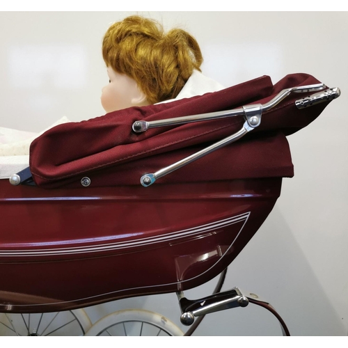 4088A - A beautiful burgundy Silver Cross doll's pram with matching bag, complete with Silver Cross pram bed... 