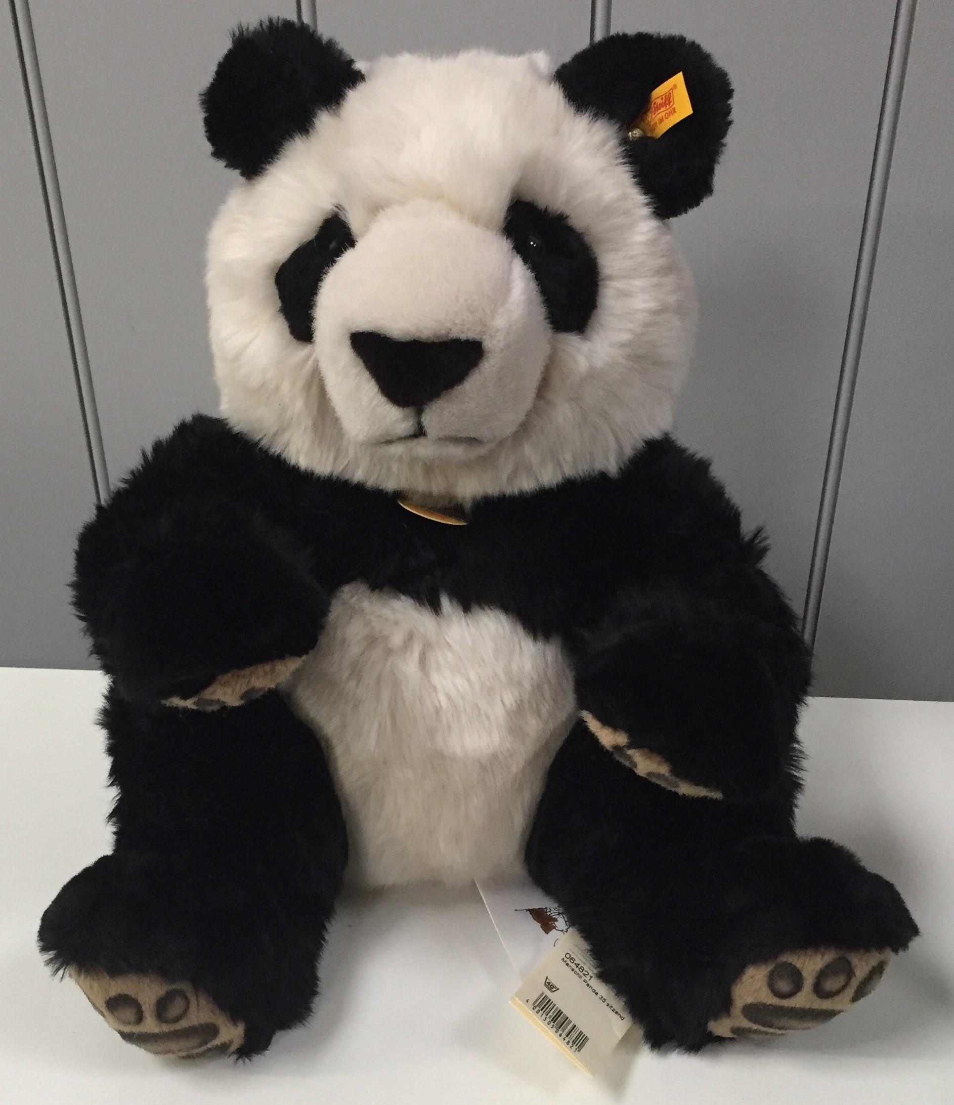 Steiff Manschli Panda bear. Soft black white plush with paw details. Catalogue number 064821