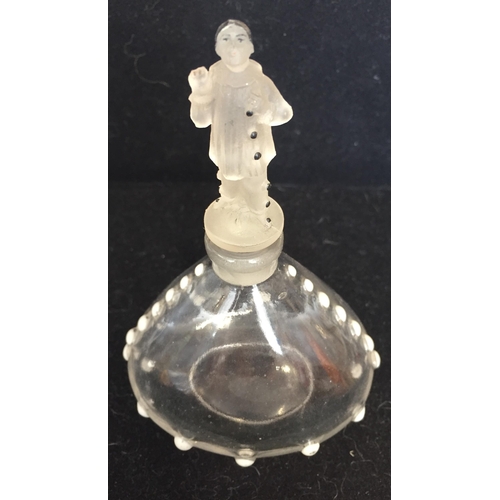 228 - A Dubarry 'A Toi' Depinoix perfume bottle, with a frosted glass pierrot stopper, designed by Julien ... 