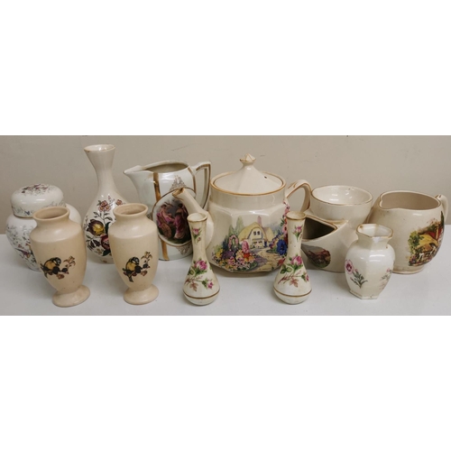 550 - A collection of twenty-five eclectic ceramic pieces. To include cups, 'train' plates, teapots & vase... 