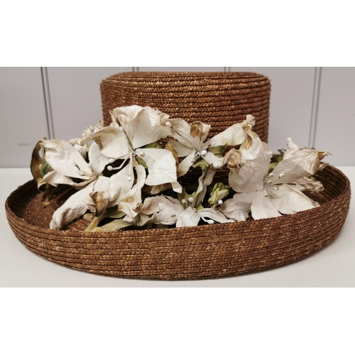 712 - A duo of ladies' formal straw hats, by 'HatBox'. To include brown & green examples, together with a ... 