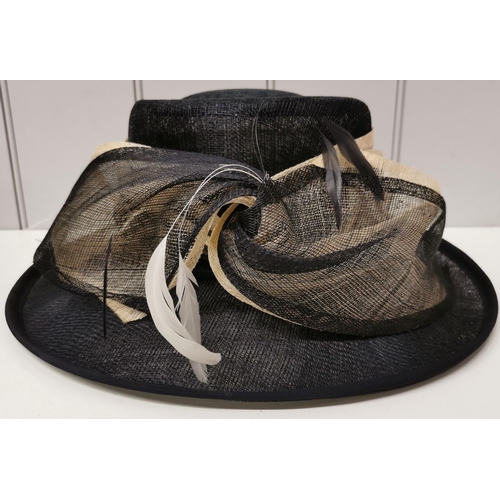 714 - A duo of ladies' formal straw hats, in navy blue, by HatBox (flowers) & Debut (feathers), together w... 